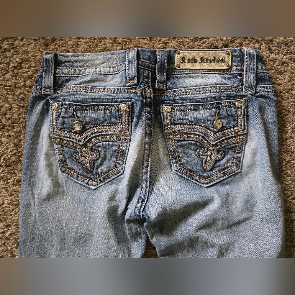 Rock Revival Blue Jeans with Ornate Stitching and Distressed Look